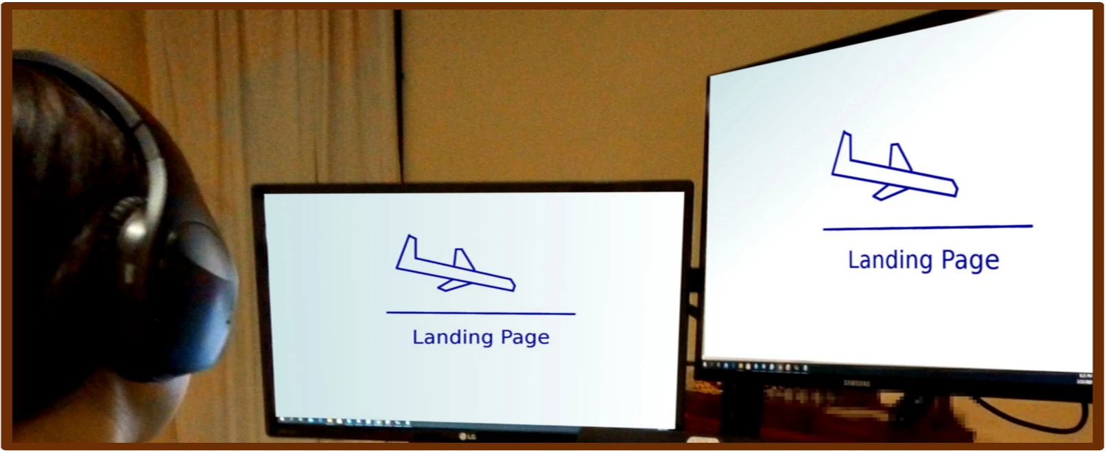 Two landing pages displayed on two monitors