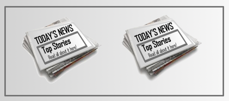 Two stacks of newspapers displayng their effective headlines